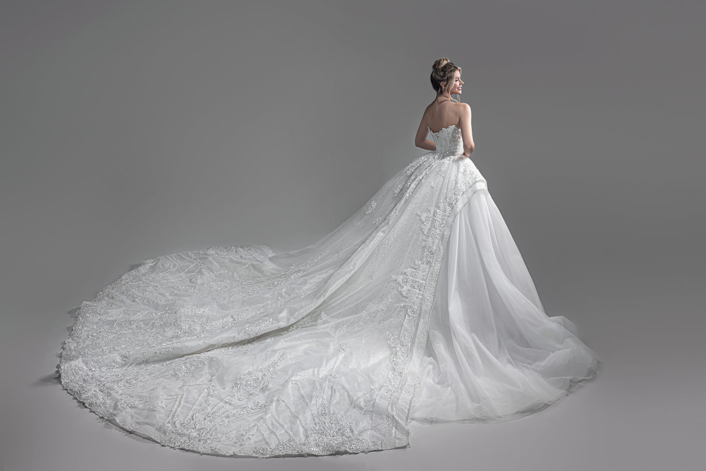corset wedding dress - walking down the aisle - long train - long trail wedding dress - sparkly train - luxury bridal gown - designer bridal gown
