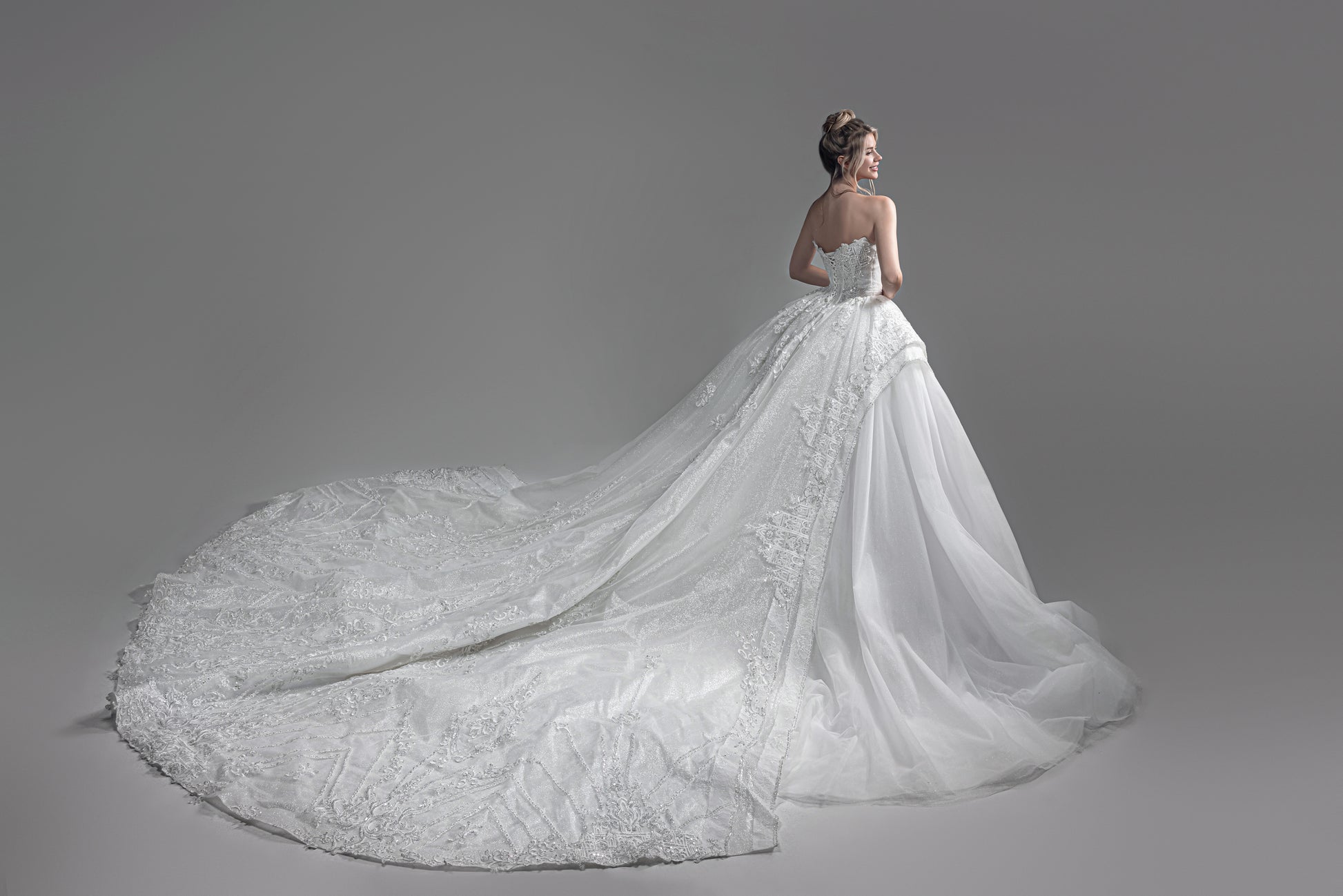 corset wedding dress - walking down the aisle - long train - long trail wedding dress - sparkly train - luxury bridal gown - designer bridal gown